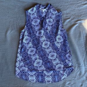 Sleeveless cross front blouse